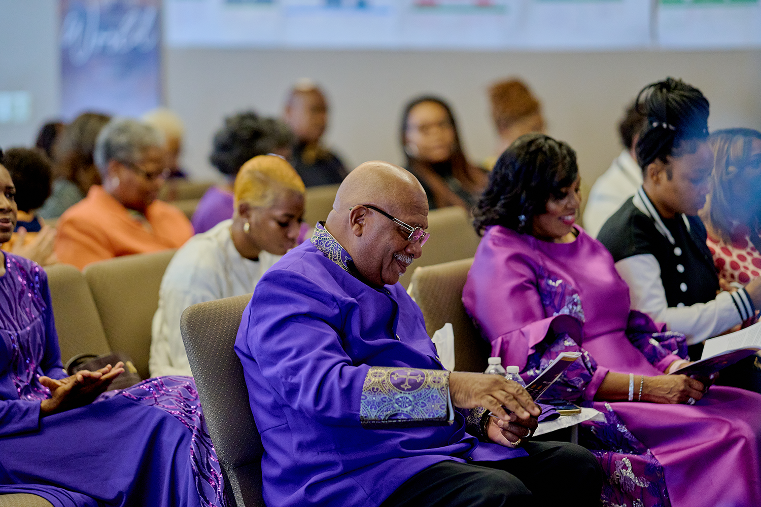 Empowerment Unlimited Church members and pastors seated in sanctuary